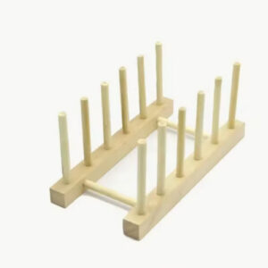 Multifunctional wooden kitchen organizer rack holding dish lids and cups against a neutral background